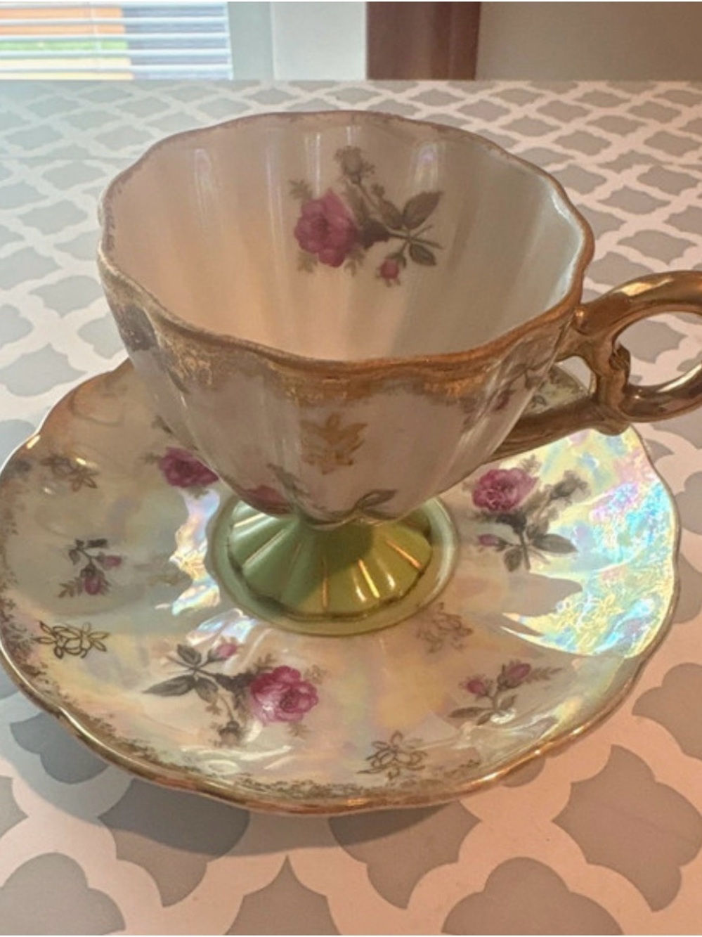 Vintage pedestal teacup and saucer set
